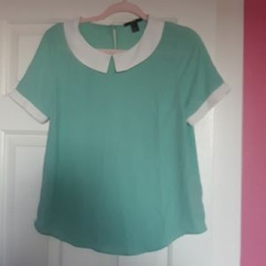 Teal shirt with white collar